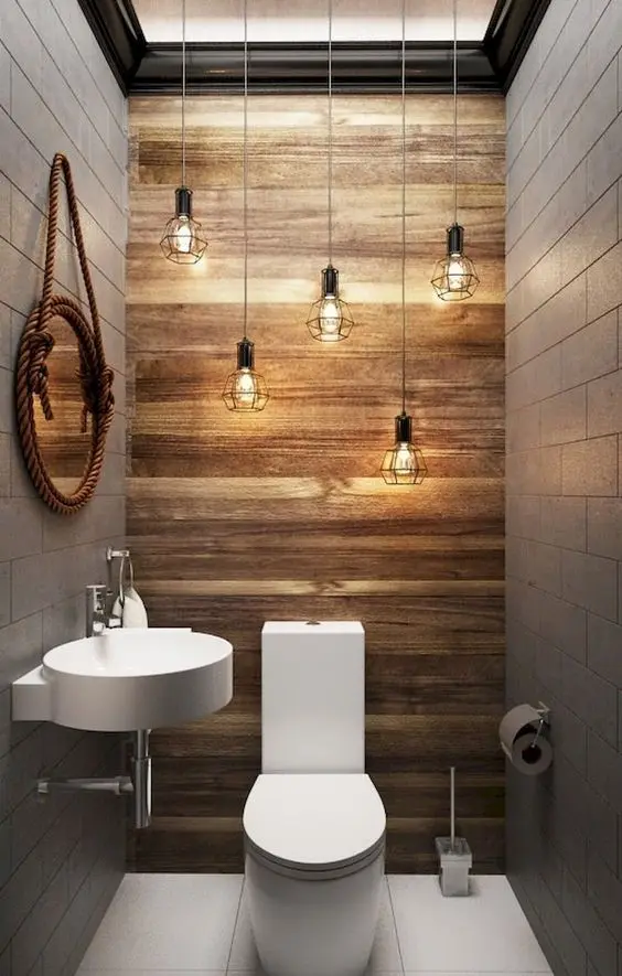 Modern Rustic powder room: The rustic look is one of the top favourites amongst powder room ideas and designs. Balance the