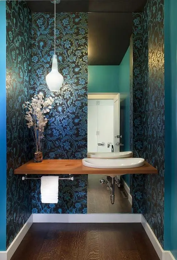Refined Blues powder room: Give your plain and boring blue powder room a good dose of classy and refined styling by