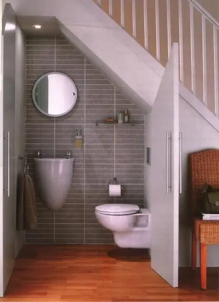 under the stairs powder room