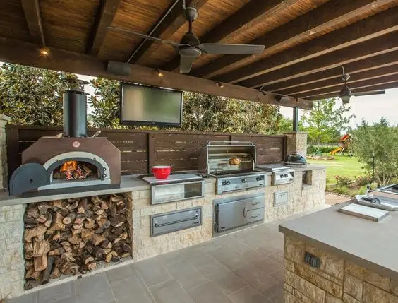 Country Bricked outdoor kitchen: So country, so charming. The most natural of all outdoor kitchen ideas and designs. Light