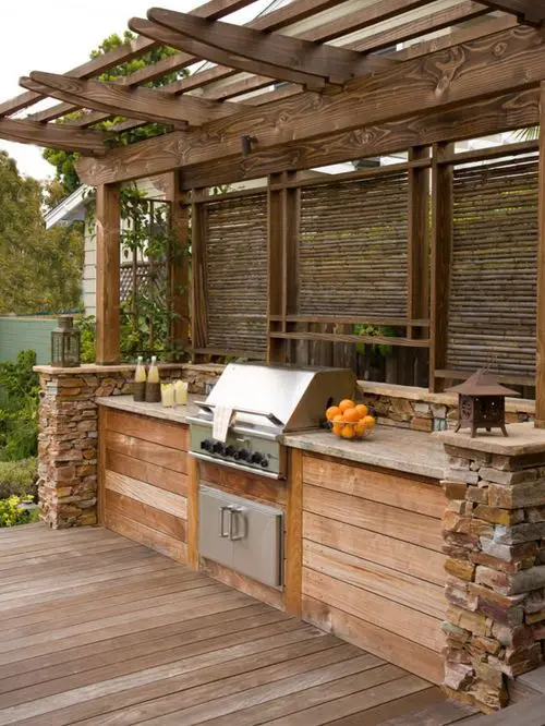 Rustic Barbecue Station outdoor kitchen: This is a man’s outdoor kitchen! Designed for endless barbecues, the modern grill
