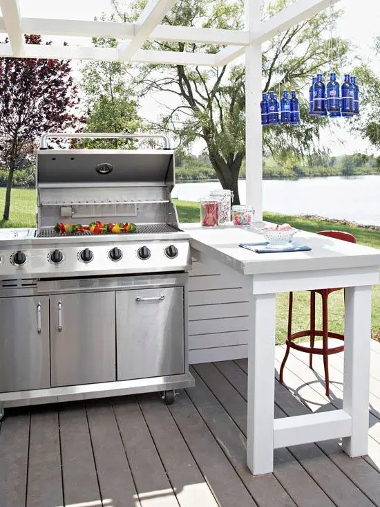 white cottage outdoor kitchen