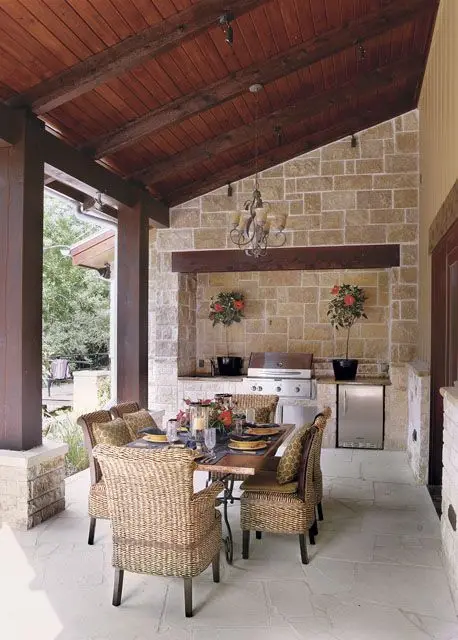 Southern Charm outdoor kitchen: The southern interiors is warm, welcoming, graceful and charming. The dark wood ceiling and