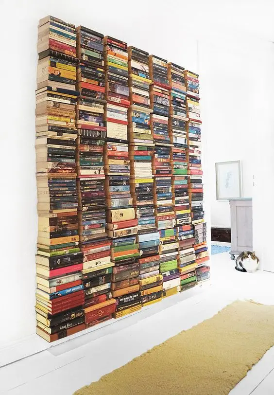 stacked books on wall