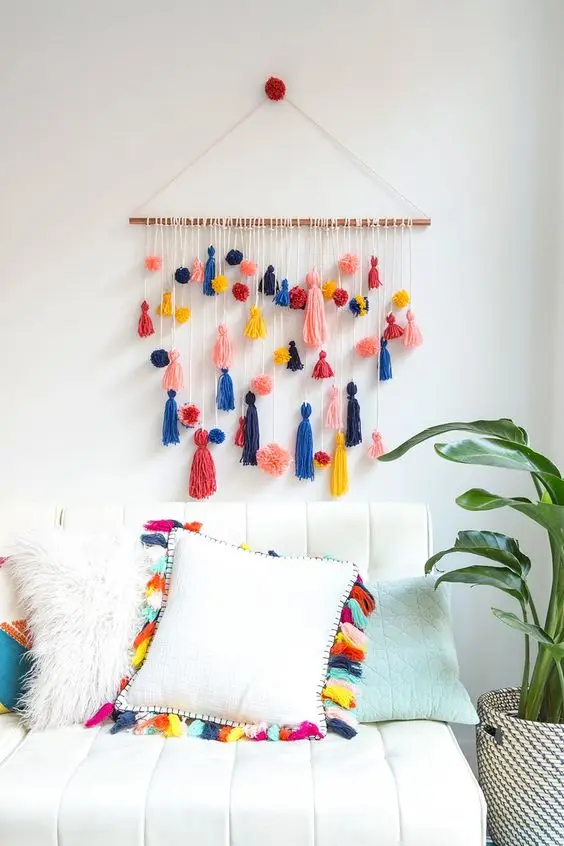 tassel and pompom wall feature