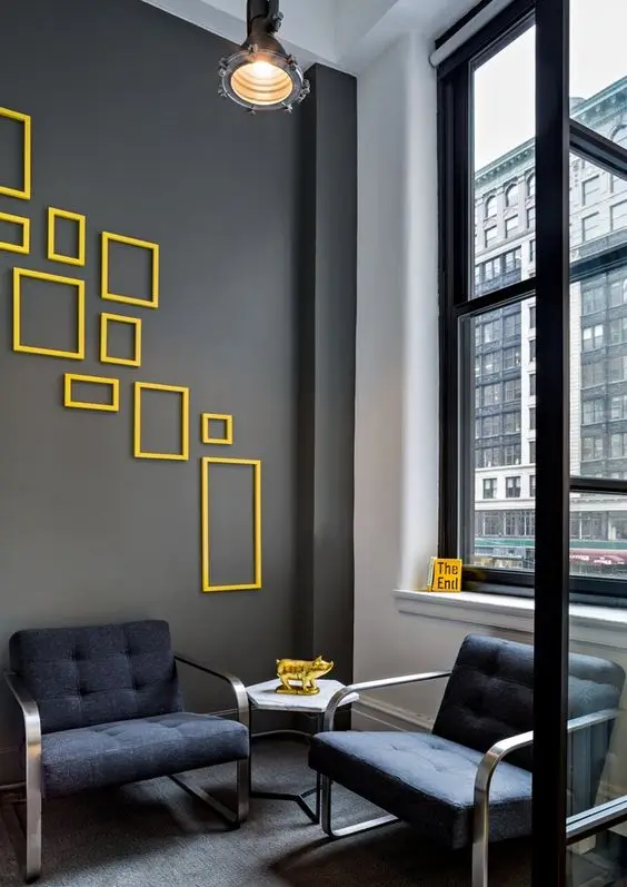 dark grey wall with yellow accents