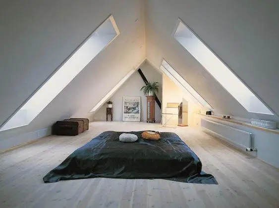 Austere Simplicity loft bedroom: The trick to making loft bedrooms look expansive is minimalism. Cut down on furnishings and