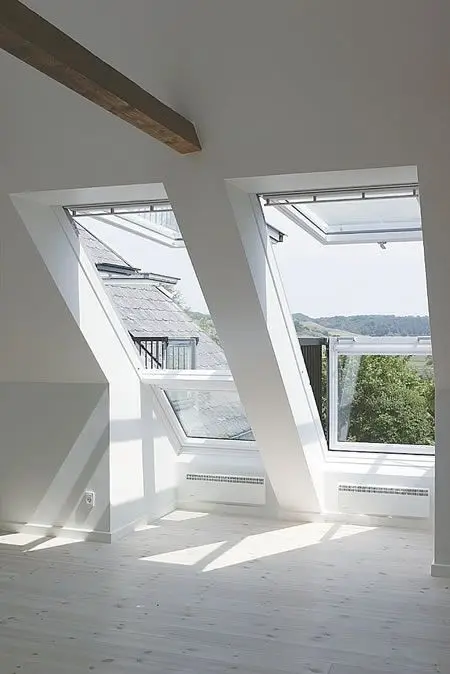 Balcony Windows loft bedroom: The Velux Cabrio balcony windows are a blessing to loft bedrooms. Balconies will instantly