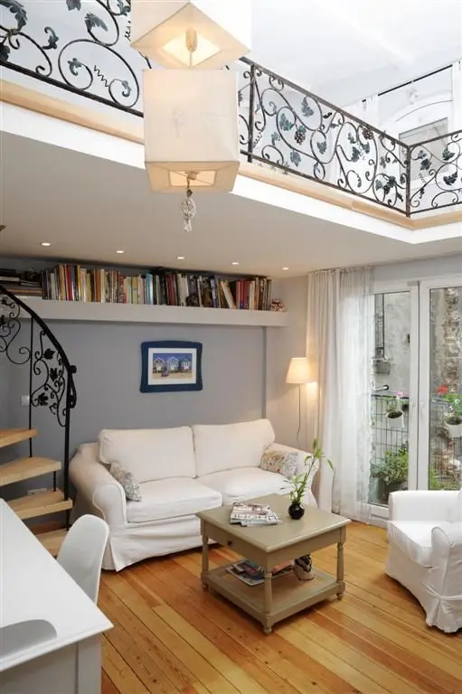 tiny house with filigree balcony