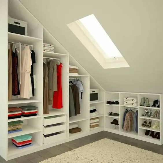 Custom-Built Closet loft bedroom: Pitched ceilings are common features of loft bedrooms. While there is ample height around