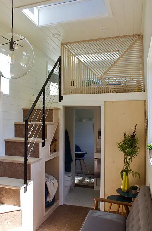 Tiny House Bedroom: Loft bedrooms are inherent to tiny houses and often are just overhead crawl spaces with a mattress. The