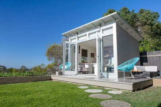 white modern backyard home office
