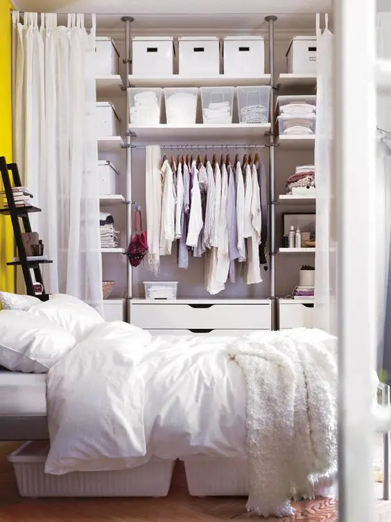 Curtained Storage bedroom closet: No space for a closet? No problem. This curtained off wall shelving can perfectly serve