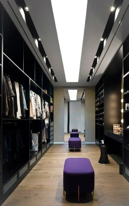 Sleek Black bedroom closet: This modern minimalist closet is also chic and edgy. Black as the dominant colour theme gives a