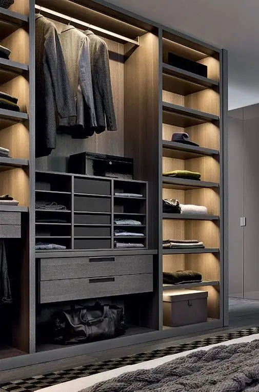 Man of the City bedroom closet: Dignified, efficient and sleek. This one-wall closet has all the space and places for the
