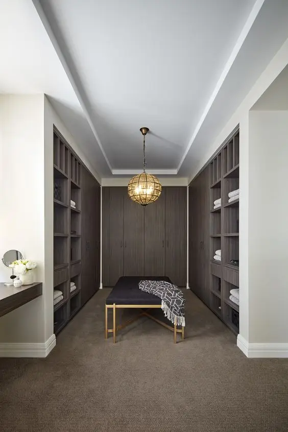 Open Nook bedroom closet: Forget about separate rooms for your bedroom closet with this open nook design. This closet