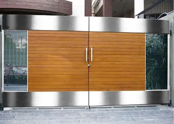 Striking Wood and Chrome front gate: Solid timber panels for privacy, chrome side screens for the view out