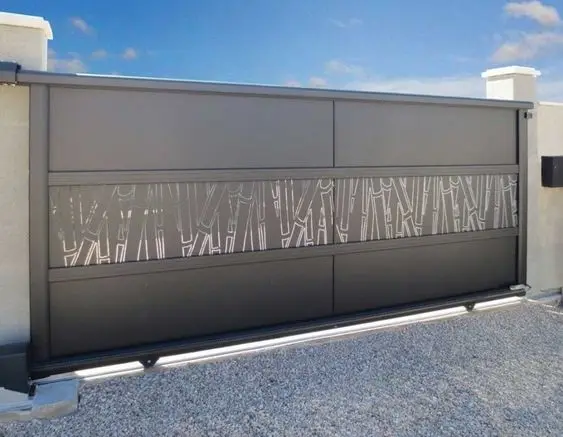 Etched Aluminium front gate: A bamboo pattern etched into a solid aluminium panel turns the most practical gate material going