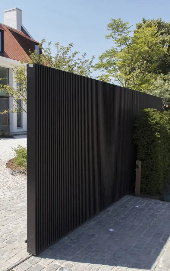 Black Metal Slider front gate: A full-height black metal slider