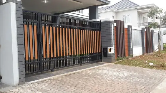 Wood and Iron front gate: Timber set into a grey steel frame, mid-century in spirit