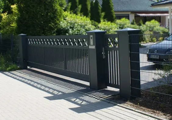 Contemporary Wrought Iron front gate: Wrought iron minus the curls: straight bars, minimal trim