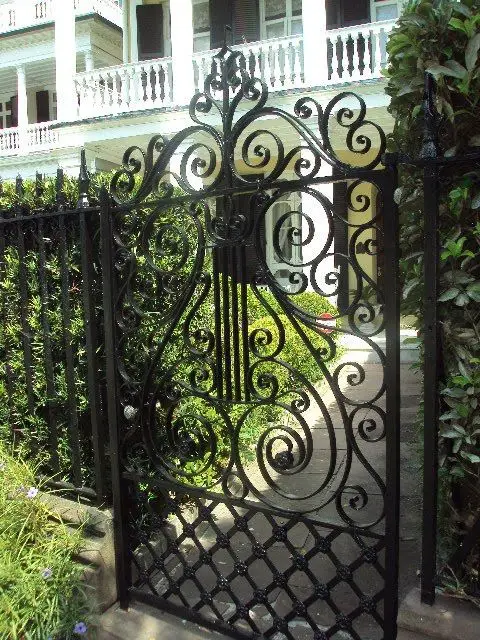 Timeless Wrought Iron front gate: Wrought iron is one of the few gate styles that has never cycled out of fashion