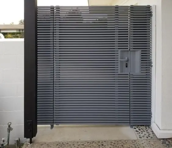 Aluminium Screen front gate: Perforated aluminium lets you see out while passers-by only half-see in