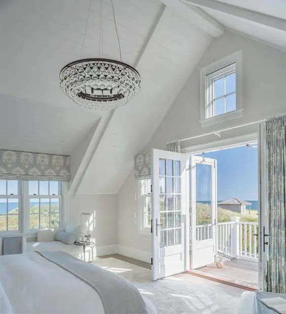 white bedroom with balcony
