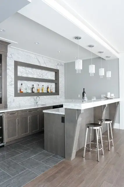 Marbled Opulence home bar: For those who aren’t afraid to party in the light, this bright and magnificent home bar is for you!