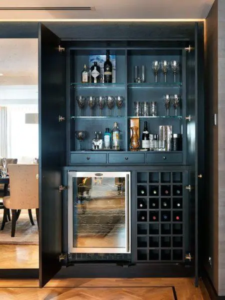 Bar in a Cabinet: This home bar is kept away from plain sight but is nearby and handy when situations call
