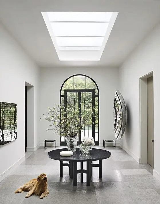 elegant foyer with skylights