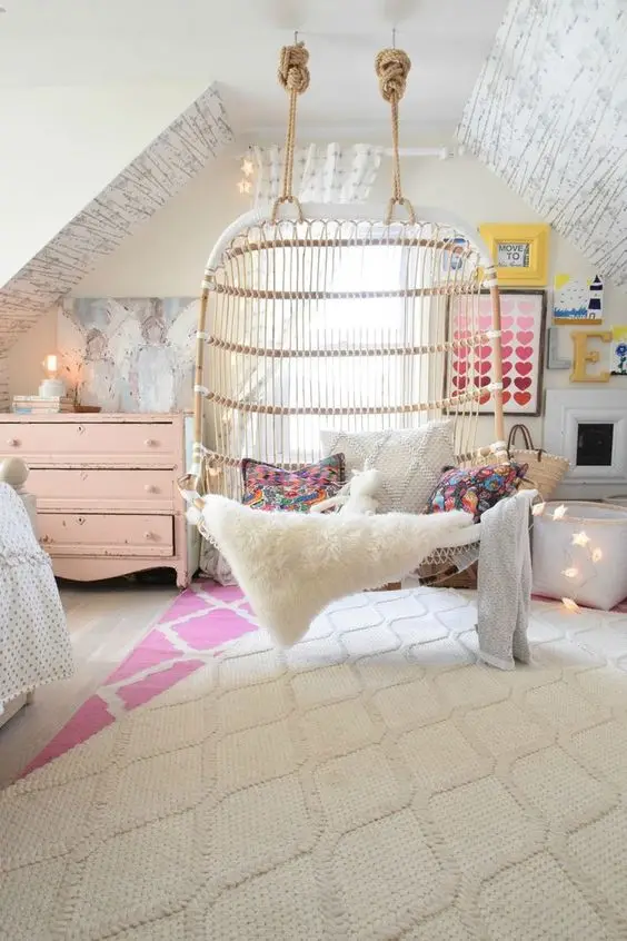 Comfy Swing kids' bedroom: This pretty and bright attic bedroom is every girl’s delight! The white overall interiors come