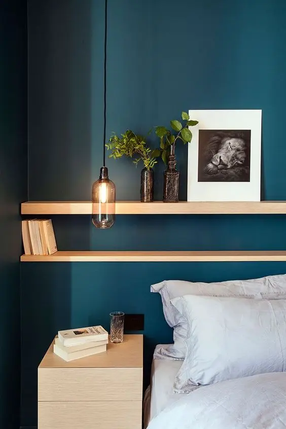 Teal it Chic bedroom: The deep teal tone of this modern bedroom is the base and the highlight of the design. The