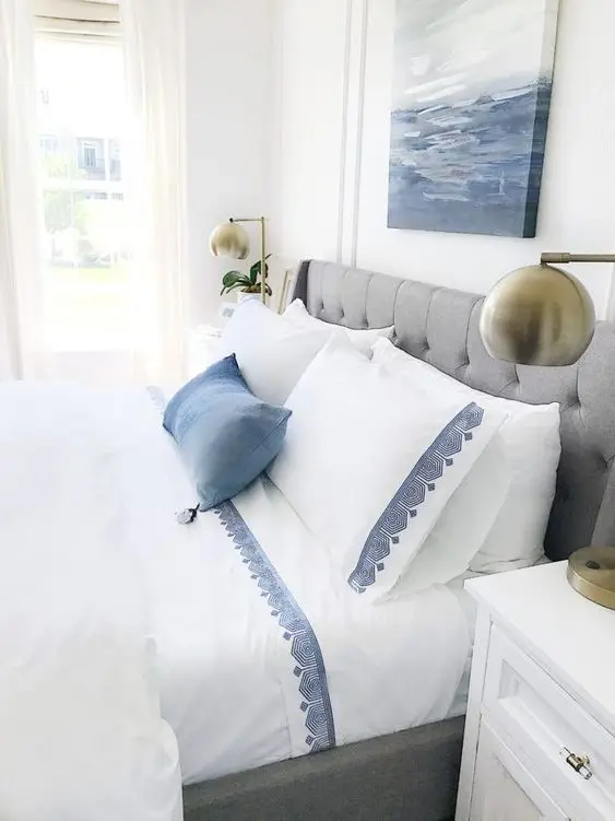 Bright Grecian bedroom: Bring in the bright days and warm Mediterranean air with this Grecian-themed bedroom. White walls