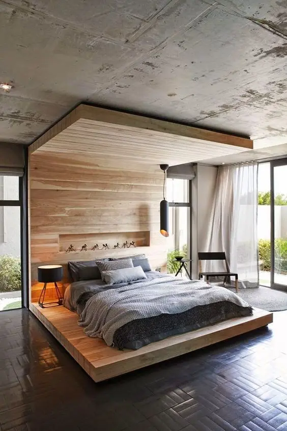 Natural and Neutrals bedroom: A beautiful amalgamation of rough and polished, of cool concrete and warm wood tones. The