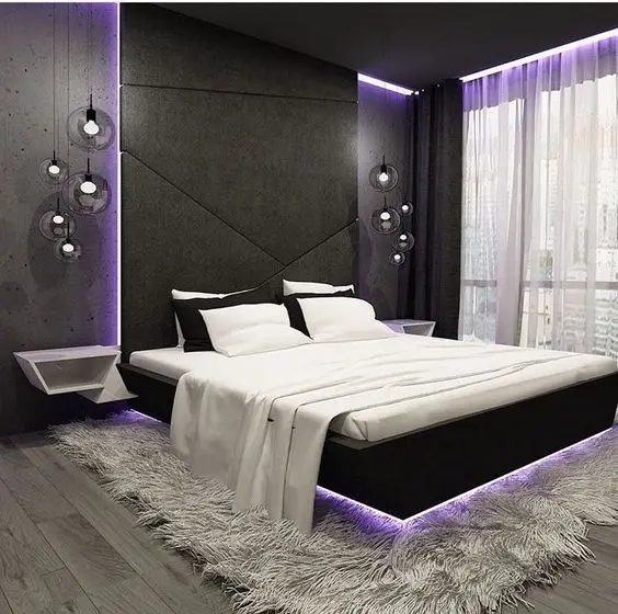 Purple Highlights bedroom: This ultra-modern grey and black bedroom gets a funky element – purple lights! Black concrete