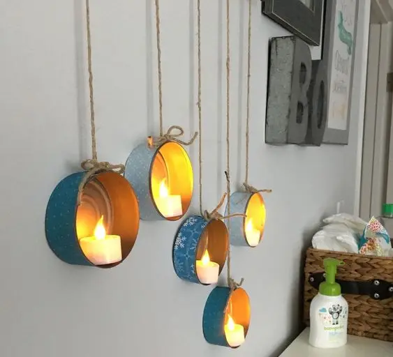 Tin Lanterns DIY home décor: Easy, quick and no-spend DIY home décor project. Collect and wash discarded tin cans. Wrap with