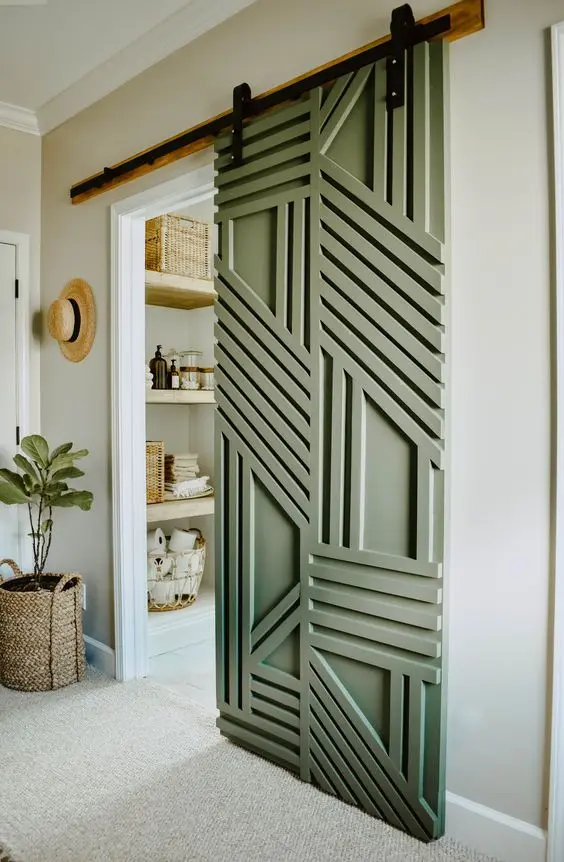 Geometric Barn Door DIY home décor: Barn doors are on-trend for its farmhouse charms and space-saving features. This spruced