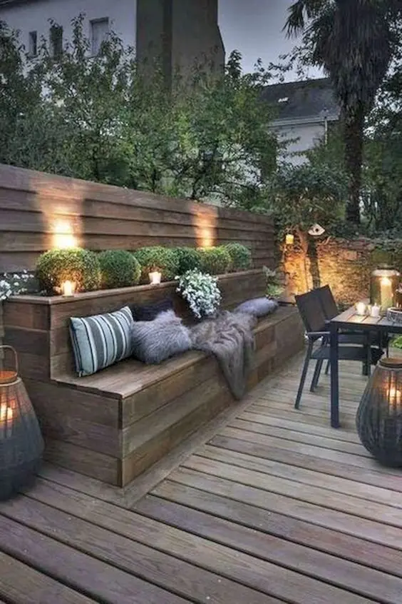 Built-in Seats deck and patio: Bench seating built into the fence line frees up floor space a small patio doesn't have