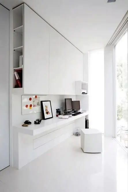 White Office Nook: Turn an awkward nook in the house into this ultra-modern home office. The all-white interiors make the