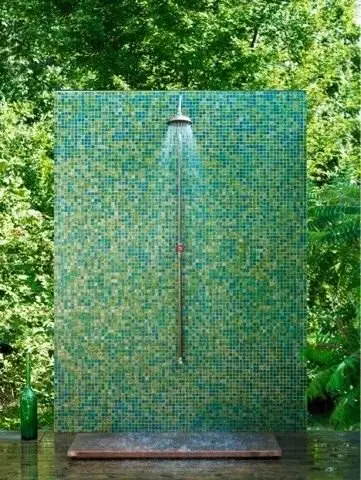 A Green Wall outdoor shower: Emerald and lime tiles that camouflage the shower against its own garden. Hiding in plain sight