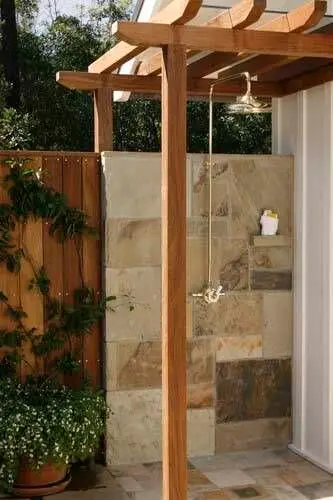 Shower and Pergola: A mini pergola built over the shower nook defines the space and gives climbers somewhere to go, with