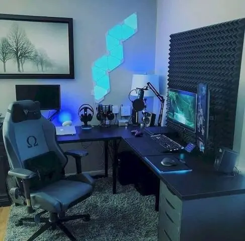 Hazy Cocoon gaming home office: Get lost in time and space in the hazy cool of this gaming room. The soft grey walls and rug