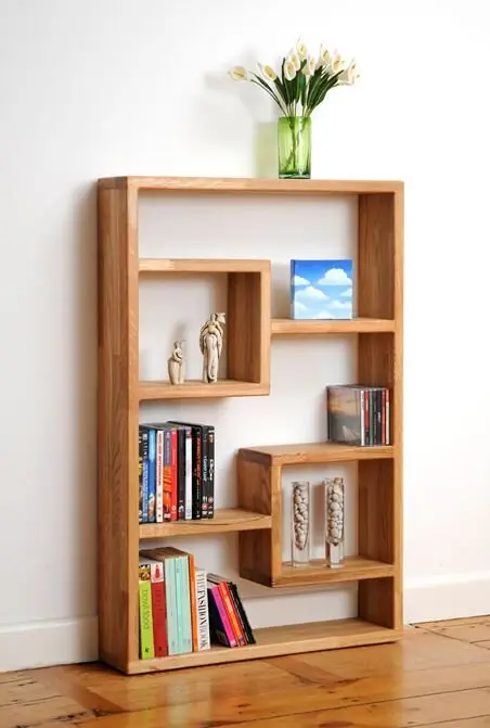 Easy Bookcase wood project: One timber profile throughout, cut to length, sanded, screwed together, varnished. If you've
