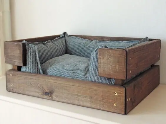 Easy Pet Bed Frame wood project: A few recycled lengths, a plywood base, and the dog has a bed that isn't the couch. Sand it