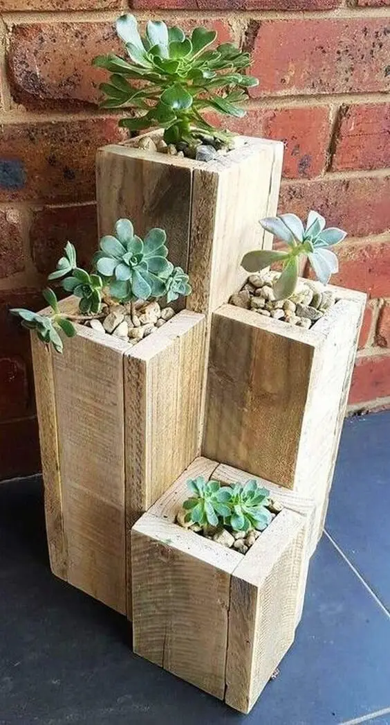 Recycled Wood Planters wood project: Square planters from mismatched plank lengths, raised so the garden gets some height