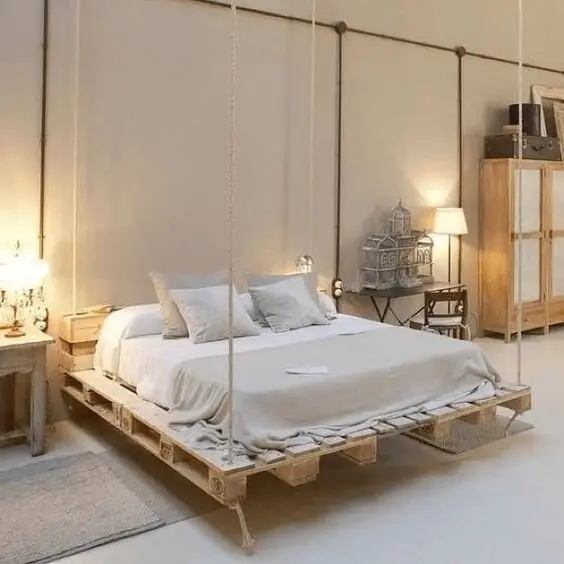 Hanging Pallet Bed wood project: A pallet bed frame hung from all four corners on rated rope or cable. Fun, and genuinely