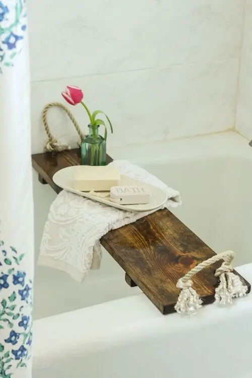Easy Bathtub Tray wood project: One plank, sanded smooth, with stabilising strips underneath so it can't slide and holes