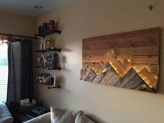 Lighted Pallet Wall Art wood project: Pallet planks arranged into a mountain-range silhouette, with LED strips tucked behind