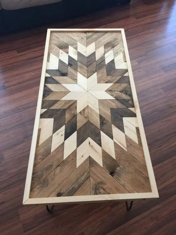 Wood Puzzle Tabletop wood project: Hundreds of small timber pieces fitted into a tribal-pattern tabletop. Be honest about